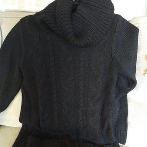 Cowl-necked black sweater with two pockets